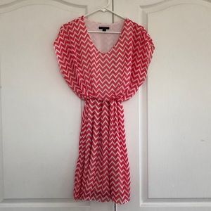 Coral and white chevron dress.  Fitted below bust.